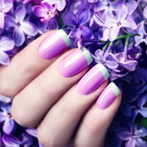 Assorted French tip nails designs showcasing variations like classic white, elegant black, and playful pink on different nail shapes.