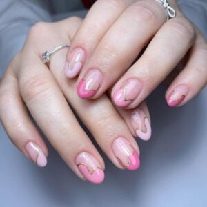 Stylish pink tip nails with a touch of elegance - french tip, hot pink, and nail designs.