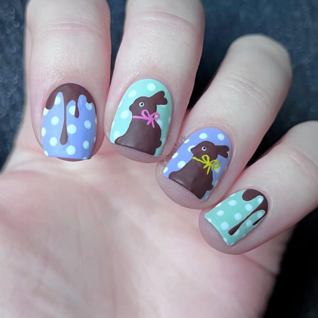 Colorful Easter nails designs with pastel colors, spring flowers, and cute Easter egg nail art for festive spring Easter nails