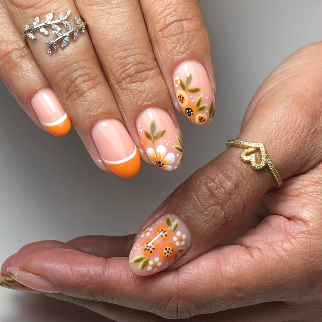 Elegant summer nails with vibrant pink and blue flower designs, featuring acrylic 3D flowers on a glossy white base, perfect for spring and summer fashion.