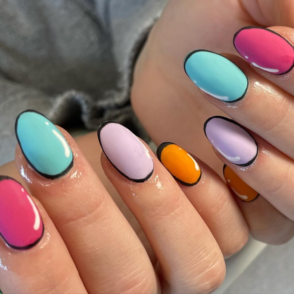 Assorted pastel nail designs featuring pastel pink nails, pastel blue, and pastel green acrylic nails perfect for spring and summer