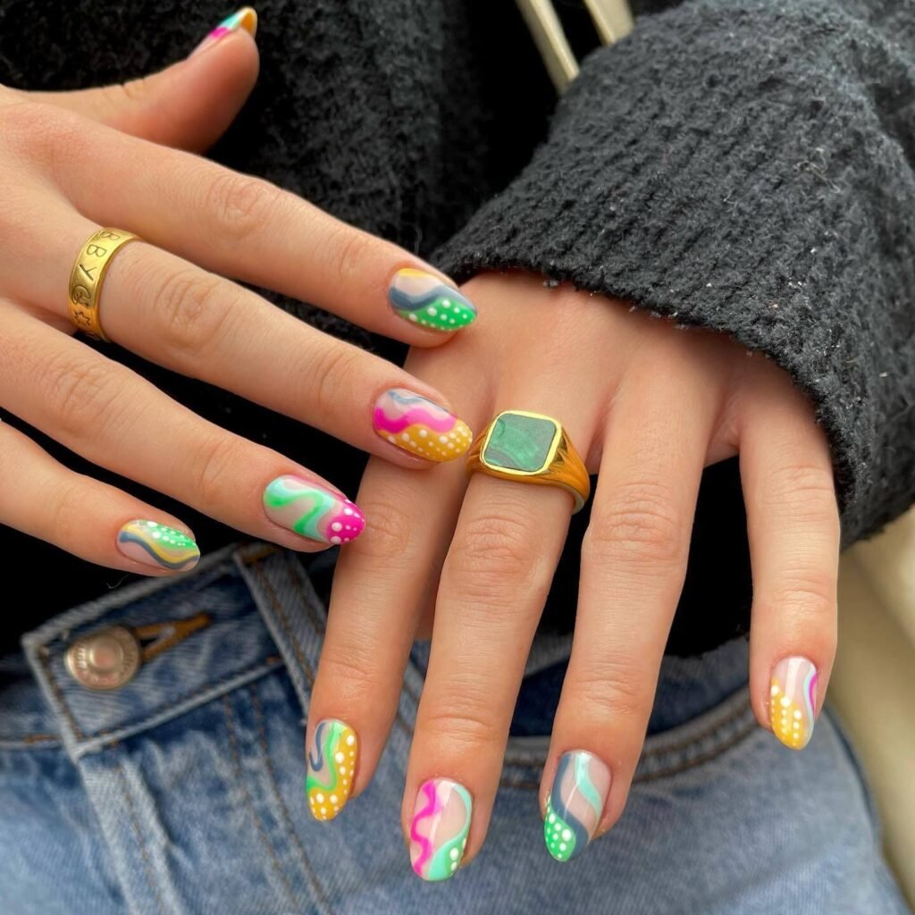 Assorted polka dot nail designs including pink polka dot nails, Easter nails, and black and white polka dot nails.